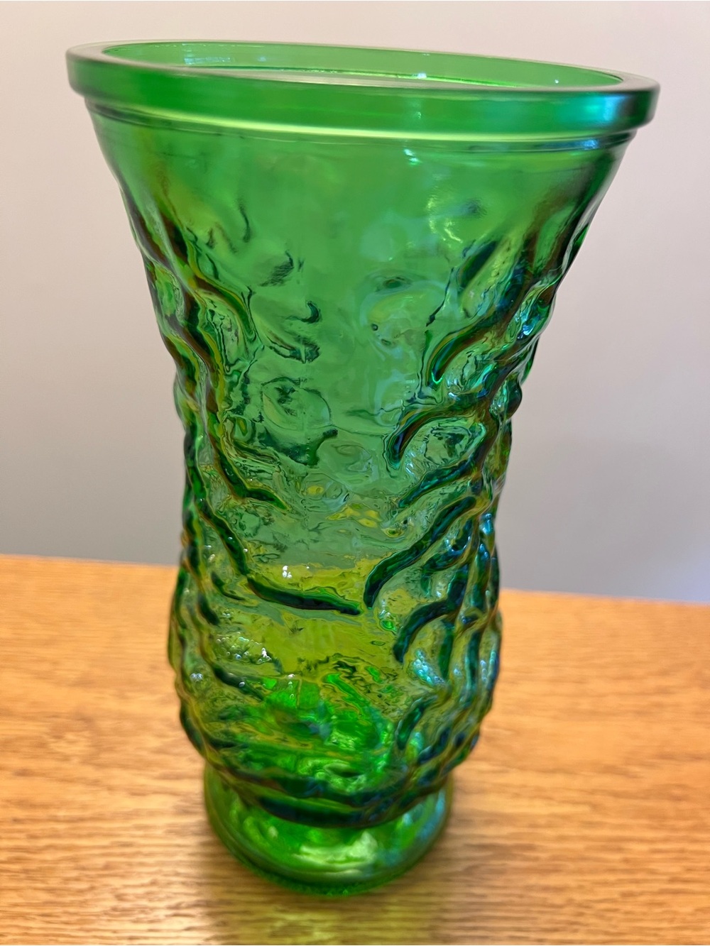 Vintage green crinkle textured glass vase produced by Hoosier Glass